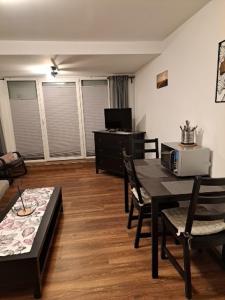 Posezení v ubytování Aulbach' s Appartments