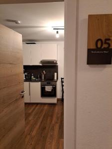 Kuchyň nebo kuchyňský kout v ubytování Aulbach' s Appartments