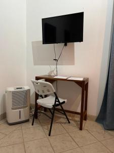 TV a/nebo společenská místnost v ubytování Puesta del Sol