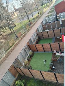 an overhead view of a garden with a park at Studio apartman Implex in Đakovo