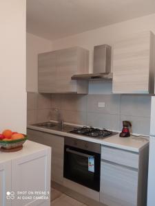 A kitchen or kitchenette at La terrazza sul mare