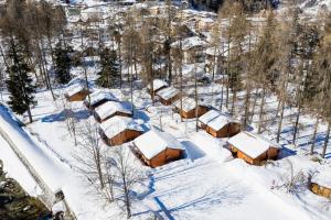an aerial view of a village covered in snow at Yes we camp! Cevedale in Ossana