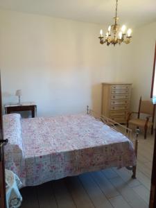 Postel nebo postele na pokoji v ubytování Villa Ester