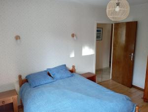 Posteľ alebo postele v izbe v ubytovaní Grand appartement rez-de-chaussée avec jardin Briançon