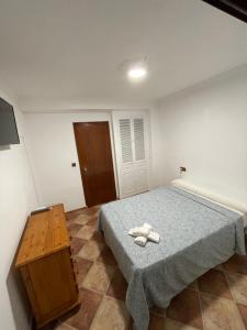 Cama o camas de una habitación en Hostal La Campiña