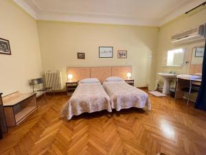 Postel nebo postele na pokoji v ubytování Hotel Panorama Bologna Centro