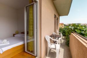 Posteľ alebo postele v izbe v ubytovaní Apartment Ivanov