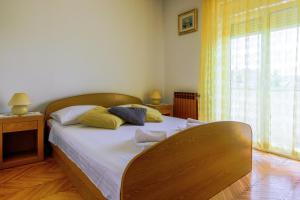 Posteľ alebo postele v izbe v ubytovaní Apartment Ivanov