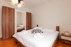 Posteľ alebo postele v izbe v ubytovaní Apartment Ivanov
