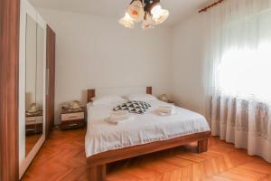 Posteľ alebo postele v izbe v ubytovaní Apartment Ivanov