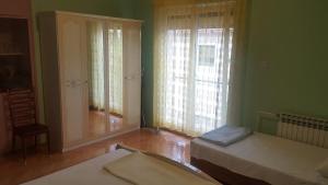 Posteľ alebo postele v izbe v ubytovaní Apartment Ivanov