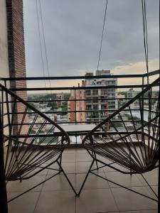 a metal bench sitting on top of a building at Monteagudo 847 in San Miguel de Tucumán