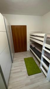 Postel nebo postele na pokoji v ubytování Ferienhaus Lara
