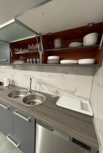 a kitchen with a sink and a counter top at Przyszowa 441 in Przyszowa +46 photos