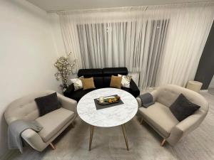 Кът за сядане в Hilton Burgas Holiday Home