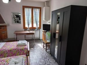A bed or beds in a room at Appartamento Degli Dei (Affittacamere)
