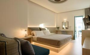 A bed or beds in a room at Armonia