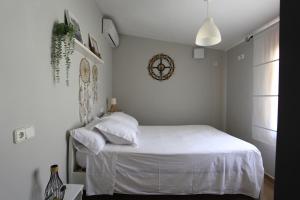 A bed or beds in a room at Casa de campo Canoret, Benissa, Alicante , Spain