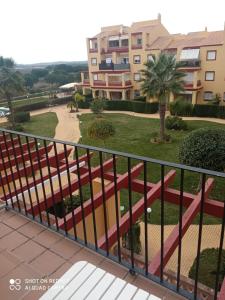 a view from the balcony of a building at Albatros Golf Costa Esuri Ayamonte Huelva in Huelva