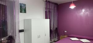 Postel nebo postele na pokoji v ubytování Appartamento tra Como e Milano