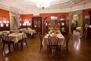 Ein Restaurant oder anderes Speiselokal in der Unterkunft Old Vienna 