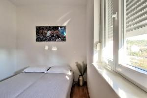 Postel nebo postele na pokoji v ubytování Airy Apt in Tisno - Murter, Beach - 3 Min Walk, 2 bedrooms, 2 bathrooms, 70m2 with terrace, mooring included