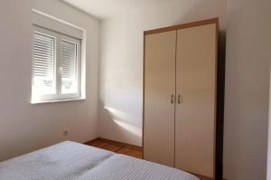 Postel nebo postele na pokoji v ubytování Airy Apt in Tisno - Murter, Beach - 3 Min Walk, 2 bedrooms, 2 bathrooms, 70m2 with terrace, mooring included