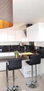 Η κουζίνα ή μικρή κουζίνα στο Studio Argenteuil