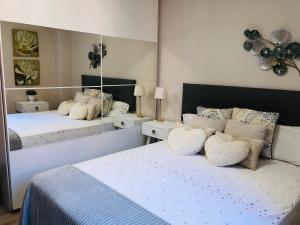Cama o camas de una habitación en Precioso apartamento en Los Castros