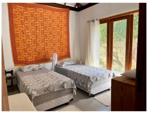 Postel nebo postele na pokoji v ubytování Casa com quintal + 18 fotografií