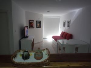 a living room with a couch and a table at Tranquilidad, privacidad y relax in Cordoba