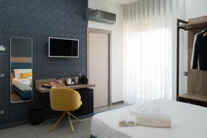 Postel nebo postele na pokoji v ubytování MyHouse Pompei
