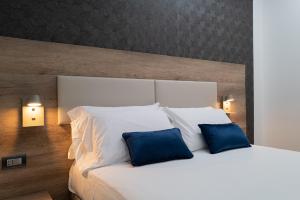 Postel nebo postele na pokoji v ubytování MyHouse Pompei