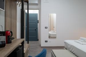 Postel nebo postele na pokoji v ubytování MyHouse Pompei