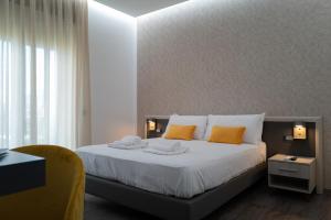 Postel nebo postele na pokoji v ubytování MyHouse Pompei