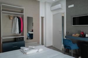 Postel nebo postele na pokoji v ubytování MyHouse Pompei