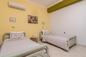 Posteľ alebo postele v izbe v ubytovaní Villa Sunshine