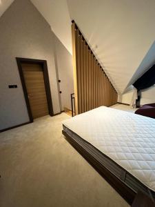 Postel nebo postele na pokoji v ubytování Woodside Lux Duplex