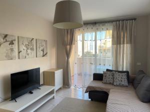 A seating area at Apartamento Pargue Tropical