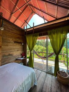 Voodi või voodid majutusasutuse Hostal velero relax toas