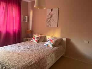 A bed or beds in a room at Apartamento Pargue Tropical