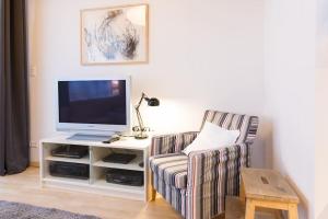 TV o dispositivi per l'intrattenimento presso Apartment Wilhelmstr für bis zu 3 Personen