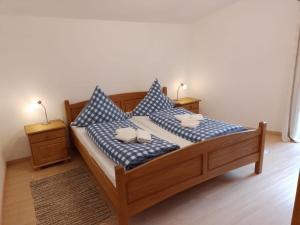 Letto o letti in una camera di Ferienwohnungen Zechmeister