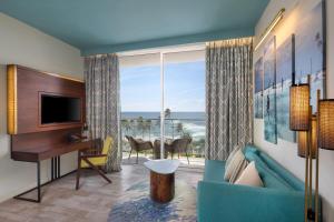 a living room with a view of the ocean at Radisson Blu Resort Galle in Galle
