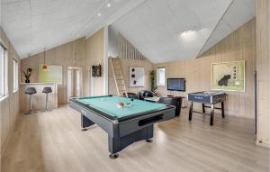 a room with a pool table and a tv at Cozy Home In Nordborg With Kitchen in Nordborg