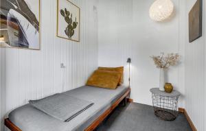 a room with a bench with a pillow on it at Nice Home In Roskilde With 2 Bedrooms And Wifi in Roskilde
