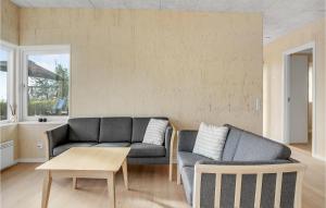 Χώρος καθιστικού στο Two-Bedroom Holiday Home In Haderslev