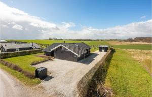 an overhead view of a house in a field at Awesome Home In Haderslev With 3 Bedrooms, Wifi And Sauna in Flovt