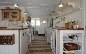Kuchyň nebo kuchyňský kout v ubytování Holiday Home Kirsebærlunden Hejls Ix