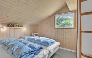 Postel nebo postele na pokoji v ubytování Nice Home In Hvide Sande With Sauna